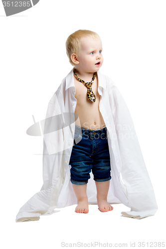 Image of Little boy in a large shirt and tie