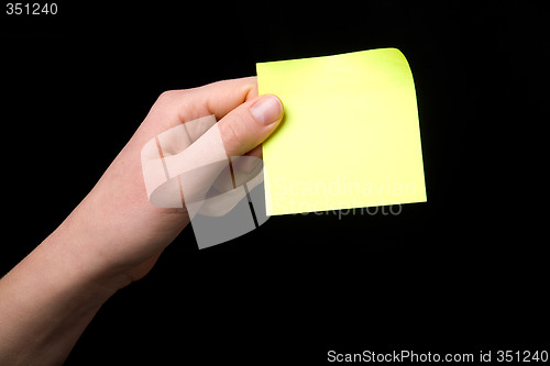Image of Holding a Sticky Note