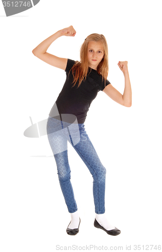 Image of Pretty slim young girl dancing.