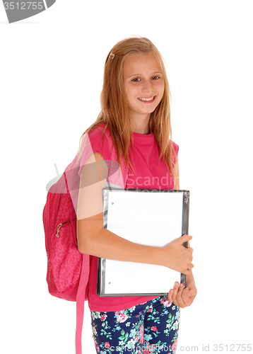 Image of Happy schoolgirl ready for school.