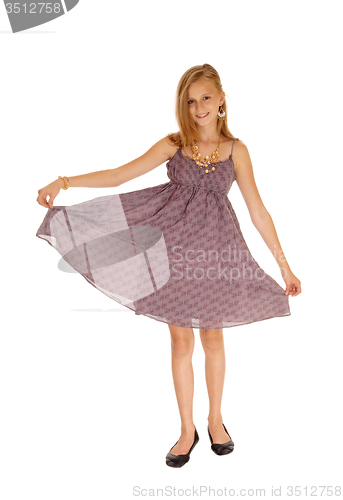 Image of Lovely girl in burgundy dress.