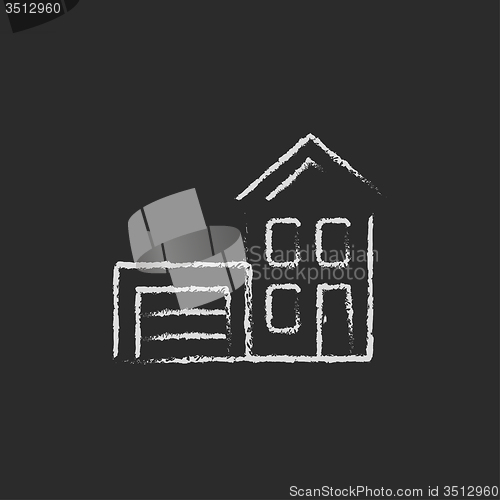 Image of House with garage icon drawn in chalk.