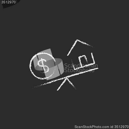 Image of House and dollar symbol on scales icon drawn in chalk.