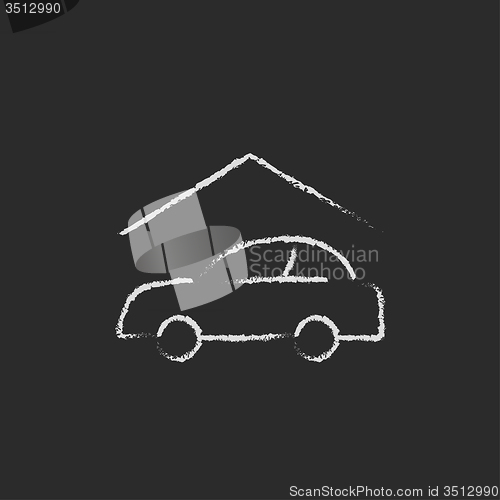 Image of Car garage icon drawn in chalk.