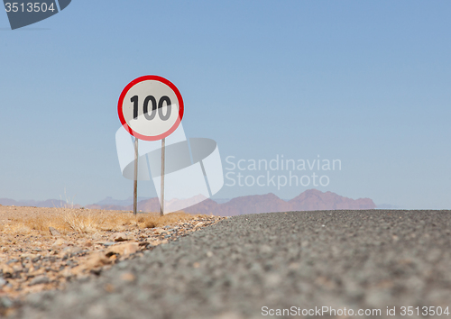 Image of Speed limit sign at a desert road in Namibia