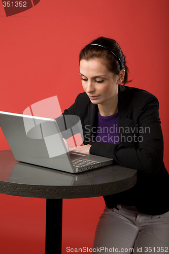 Image of Young Woman using Laptop