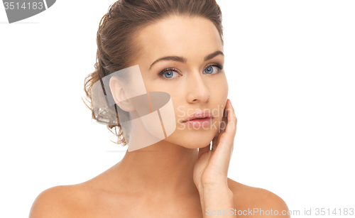 Image of face and hands of beautiful woman