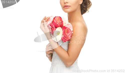 Image of woman with bouquet of flowers