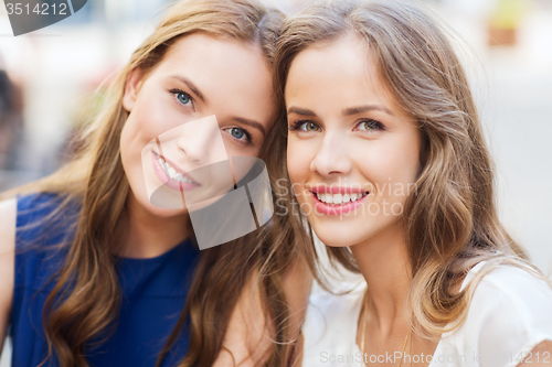 Image of happy young women or teenage girls