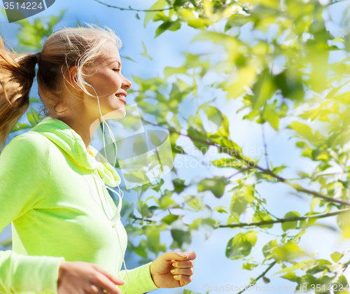 Image of woman jogging outdoors