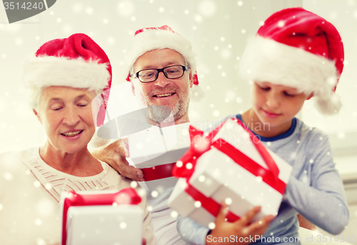 Image of happy family sitting on couch at home