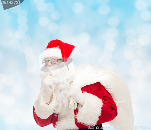 Image of man in costume of santa claus with bag