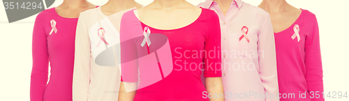 Image of close up of women with cancer awareness ribbons