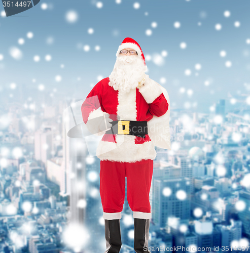 Image of man in costume of santa claus with bag
