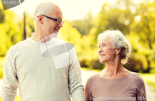 Image of senior couple in city park