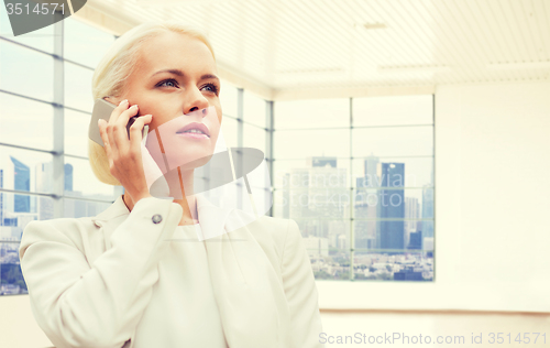 Image of businesswoman calling on smartphone