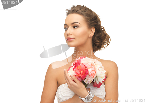 Image of woman with bouquet of flowers