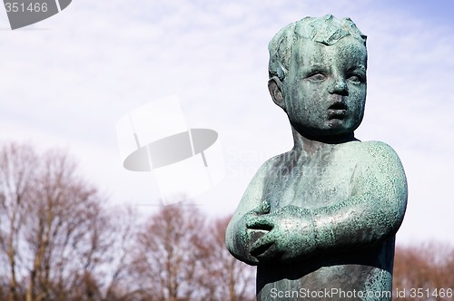 Image of Little Boy Statue