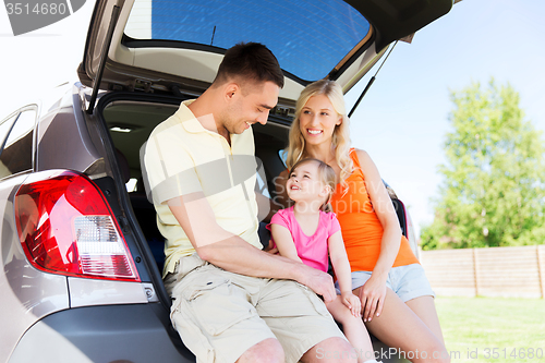 Image of happy family with hatchback car outdoors