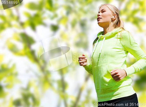 Image of happy woman running or jogging