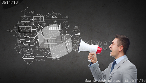 Image of happy businessman in suit speaking to megaphone