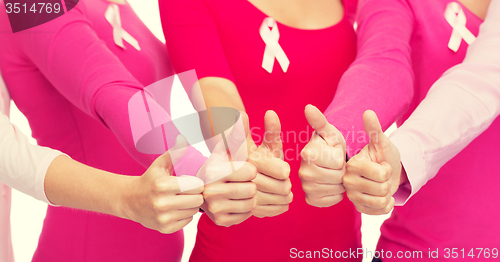 Image of close up of women with cancer awareness ribbons