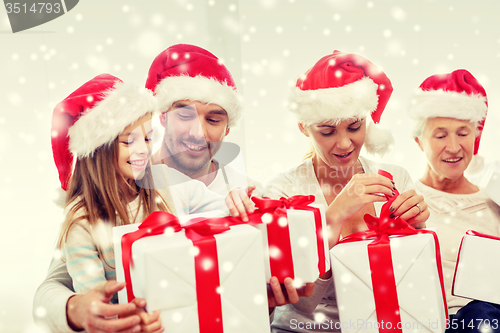 Image of happy family sitting on couch at home