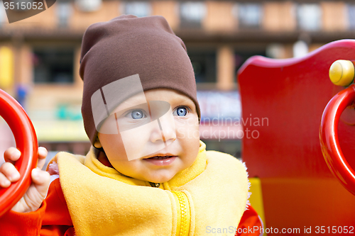 Image of Smiling little boy portrait outside