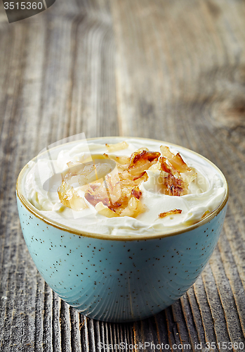 Image of bowl of dip sauce with caramelized onions