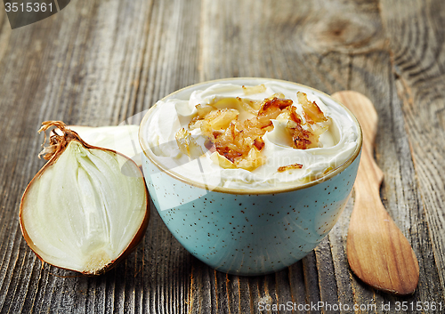 Image of bowl of dip sauce with caramelized onions