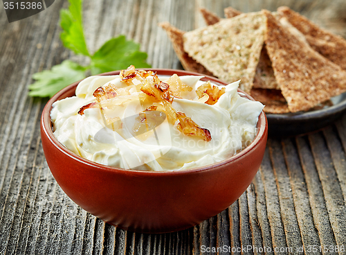 Image of bowl of cream cheese with caramelized onions