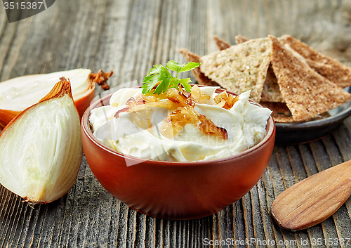 Image of bowl of cream cheese with caramelized onions