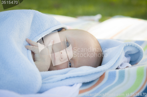 Image of Little Baby Boy Resting in His Warm Blanket