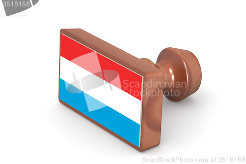 Image of Wooden stamp with Luxembourg flag