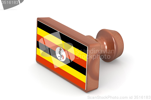 Image of Wooden stamp with Uganda flag