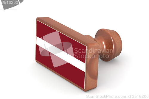 Image of Wooden stamp with Latvia flag
