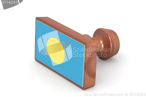 Image of Wooden stamp with Palau flag