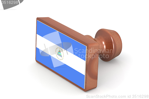 Image of Wooden stamp with Nicaragua flag