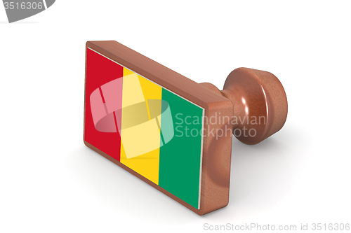 Image of Wooden stamp with Guinea flag