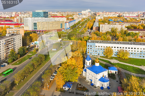 Image of Church and office buildings on road inrtersection