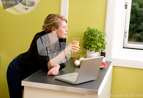 Image of In Kitchen with Laptop