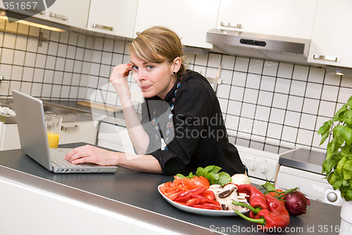 Image of Lunch in Kitchen with Laptop