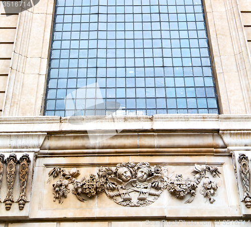 Image of old windon in england london brick and glass the wall 