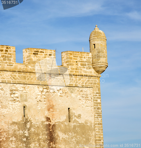 Image of  brick in old construction  africa morocco and   the tower near 