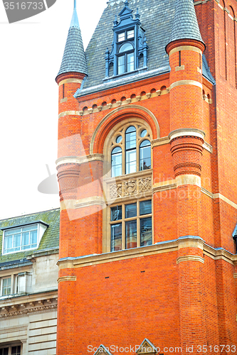 Image of old  exterior   wall architecture in  england windows  