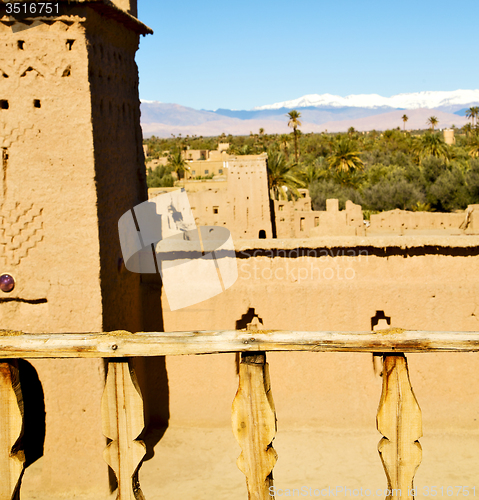 Image of brown old  construction in  terrace   near the tower