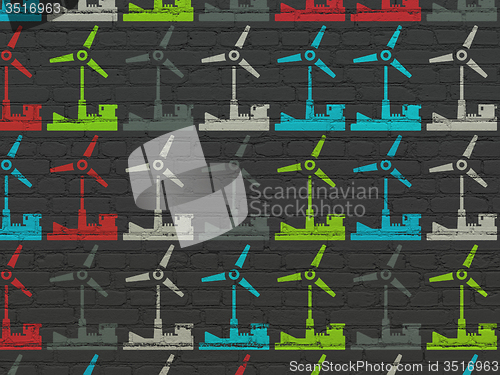 Image of Industry concept: Windmill icons on wall background