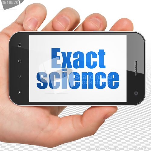 Image of Science concept: Hand Holding Smartphone with Exact Science on display