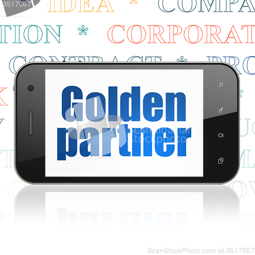 Image of Finance concept: Smartphone with Golden Partner on display