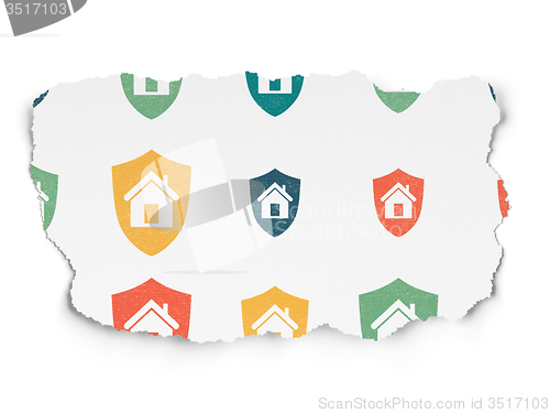 Image of Finance concept: Shield icons on Torn Paper background